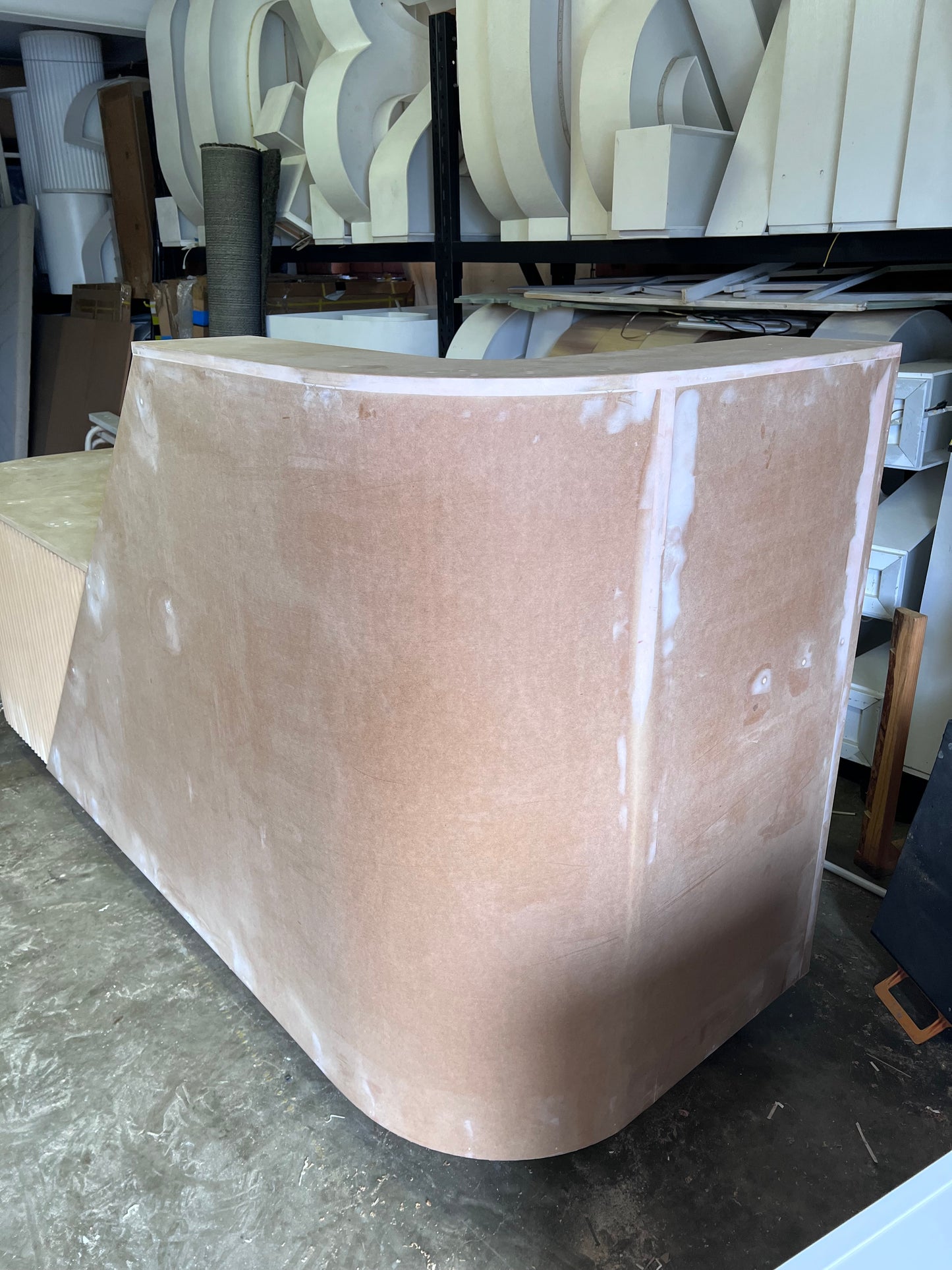 Desk with custom ripple paneling