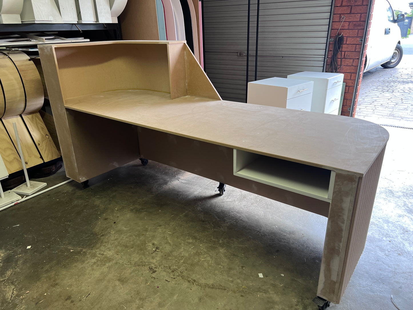 Desk with custom ripple paneling