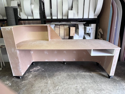 Desk with custom ripple paneling